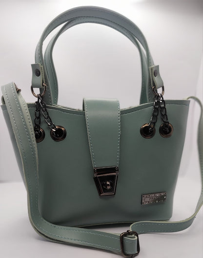 Mint Green tote bag with metallic twisted lock, crafted from premium PU leather. Features hand tote and adjustable shoulder straps, dual zippers fot storage, and a sleek solid design with metallic details. Ideal for daily use or special occasions
